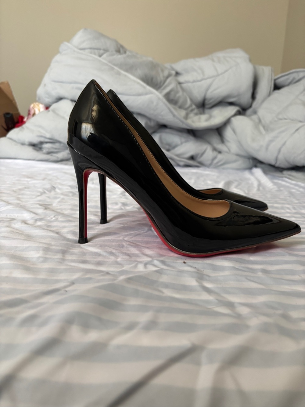 Black Patent Pointed-Toe Stiletto Pumps with Red Sole